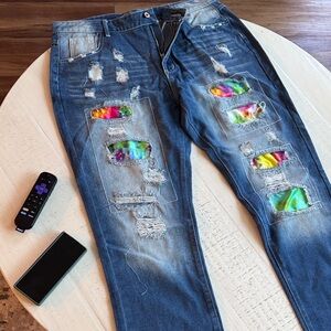 Trendy Blue Distressed Women's Jeans with Colorful Patches